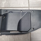 Jeep Wrangler JL Gladiator JT front bumper closeout panel for the right passenger side in black color, displayed on a floor.